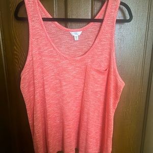 A coral sweater tank top